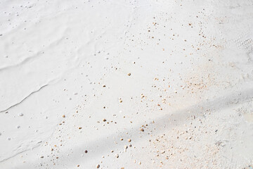 White gray mud dirt puddles after rain Holbox island Mexico.