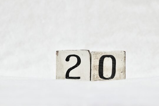 20 calendar date number, white snowy winter background copy space