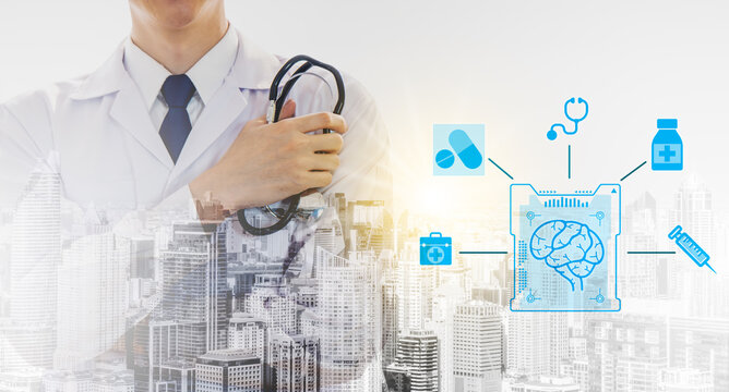 Front view of smart young male doctor crossed arm and holding stethoscope while standing outdoors with abstract city on background. Brain of a person and connection with medical equipment icons
