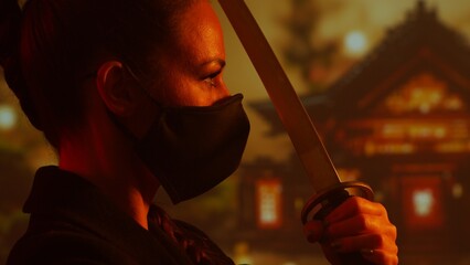 Young and beautiful ninja girl in a mask and with a katana. Samurai woman on the background of...