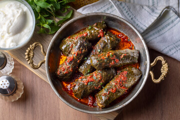 Stuffed collard greens with boiled leaves, traditonal turkish black sea region food, sarma, dolma (Turkish name; Kara lahana sarmasi)