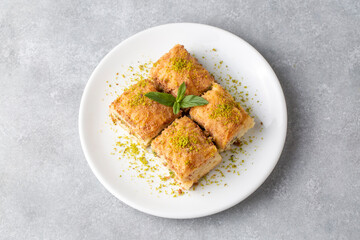 Traditional turkish new dessert cold milky baklava with pistachio (Turkish name; soguk baklava)