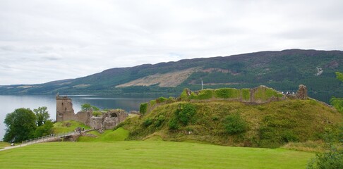 Fototapeta na wymiar Landscape of the Highland with ruins of medieval castle in Scotland