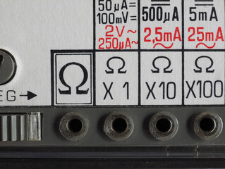 electrical symbol on vintage analog multimeter