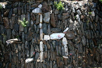 Sector Llamas. A representation of a Llamas with white rocs in one of the terraces in ruins of...