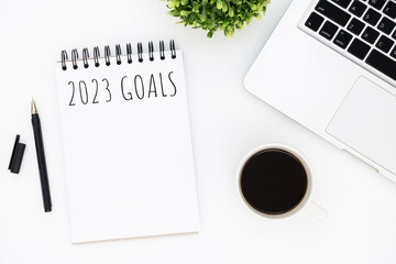 Notebook with 2023 goals text on it to apply new year resolutions and plan.