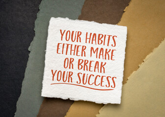 your habits either make or break your success - inspirational note on white handmade paper against paper abstract in earth tones, personal development and growth concept
