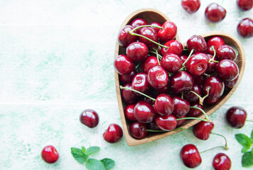 Fresh red cherries fruit in bowl