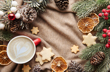 Christmas and winter cozy background with warm sweater and decorations.