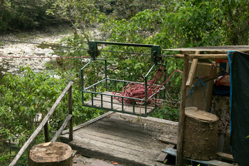Oroya to cross the river. Hiking from Santa Teresa Hidroeléctrica to Aguas Calientes to reach Machupichu. Path following the train tracks with several hikers.