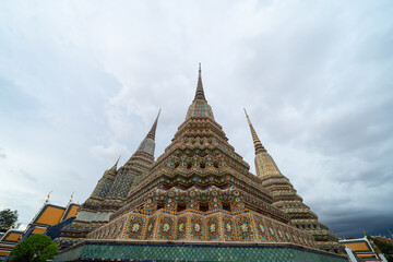 Fototapeta premium Wat Phra Chetuphon or Wat Pho, a Buddhist temple in Bangkok City, Thailand. Thai architecture buildings background in travel trip and holidays vacation concept.