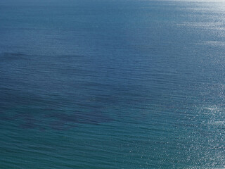 Aerial view of a clear sea blue water texture