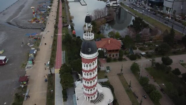 Embankment in Batumi. Tower on the Boulevard. Batumi boulevard. Tower on the boulevard in Batumi. Drone view. 