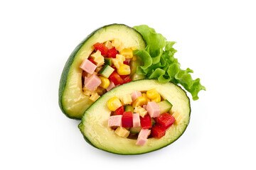 Bio organic avocado filled with cheese, corn, meat and herbs.
