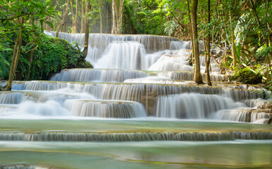 Erawan Waterfall. Nature landscape of Kanchanaburi district in natural area. it is located in Thailand for travel trip on holiday and vacation background, tourist attraction.