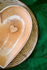 heart made of wood in a heart plate