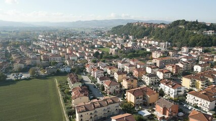 aerial view 4k 24 fps of the village of Montecchio in the province of Pesaro Urbino Marche region Italy