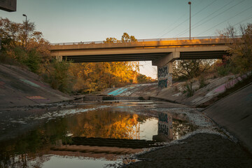 Channelized creek under a bridge
