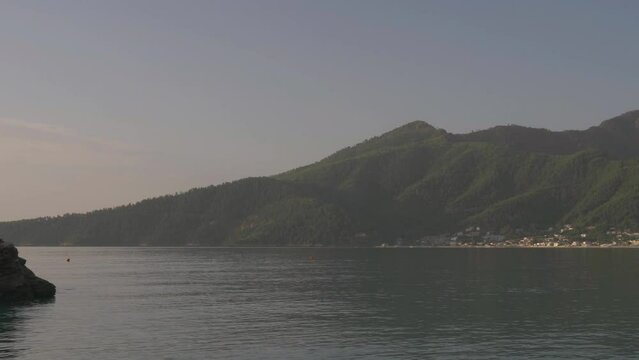 Panning view of Golden Beach and Ipsarion Mountain in Thassos Island, Greece