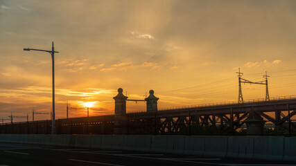 Naklejka na ściany i meble sunset on the bridge