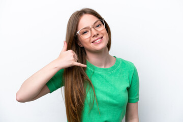 Young caucasian woman isolated on white background With glasses and doing phone gesture