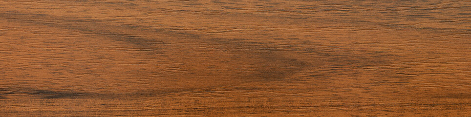 Texture of brown laminated chipboard for furniture. Panoramic banner background. Top view