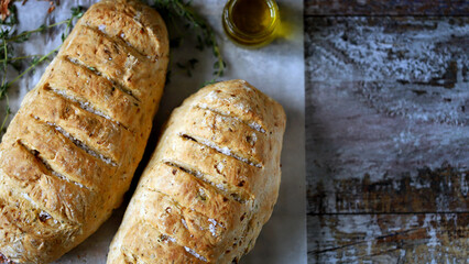 Fresh homemade bread with Italian herbs and olive oil.