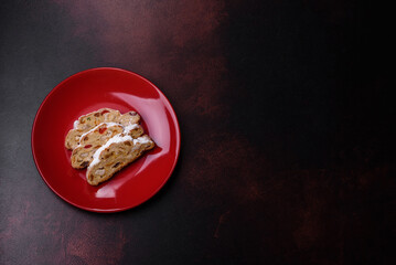 Tasty christmas stollen with marzipans, dried fruits and nuts