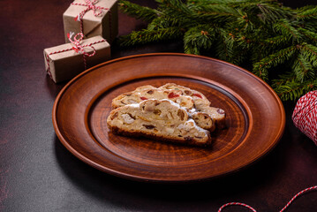 Tasty christmas stollen with marzipans, dried fruits and nuts