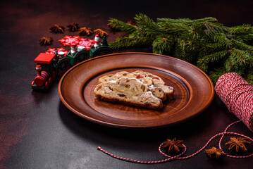 Tasty christmas stollen with marzipans, dried fruits and nuts
