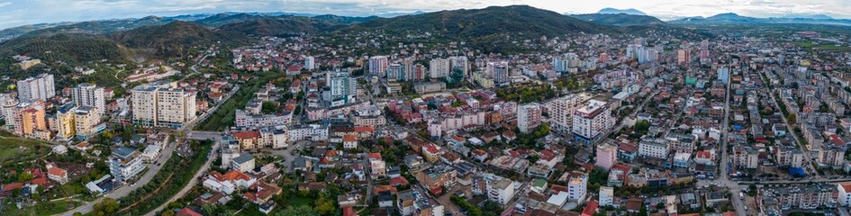 Fototapeta na wymiar Aerial view around the city Lushnjë in Albania on a sunny morning in autumn. 