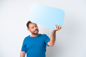 Middle age caucasian man isolated on white background holding an empty speech bubble