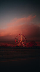 Ferris wheel at sunset in the desert