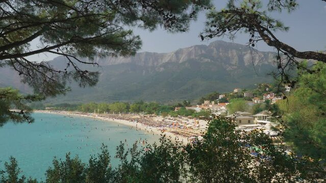 Top view landscape panorama of the Golden Beach and Ipsarion Mountain in Thassos Island Greece, viewed through the pine trees, idyllic Mediterranean popular touristic travel destination in summer