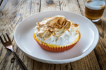 Lemon tart on wooden table
