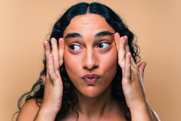 Fototapeta premium Beauty studio portrait of beautiful young woman with diastema - Confident and interesting female with diverse and unique style, concepts about skin care, body care, individuality and body acceptance