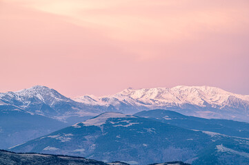 Fototapeta na wymiar Crimson sky at sunset on the mountains.