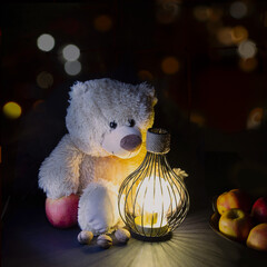 Teddy bear, lighthouse keeper with his lantern at winter night.