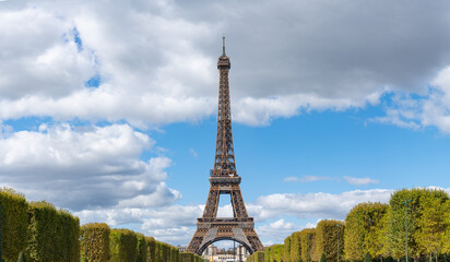 Eiffel Tower view from Champ de Mars park in Paris. France