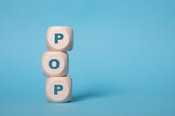 POP, point of presence internet acronym letters on wooden blocks isolated on light blue background copy space