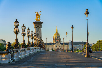 Dome of Les Invalides seen across Pont Alexandre III bridge in Paris. France