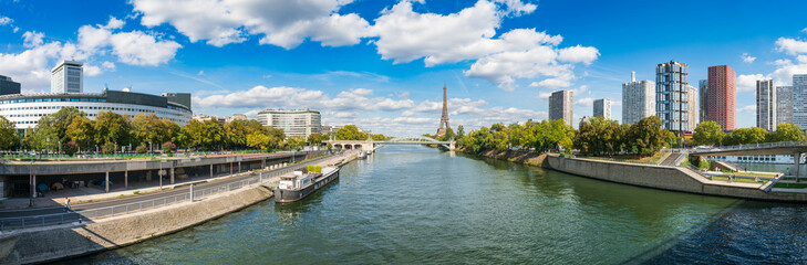 Fototapeta premium Skyline panorama of Beaugrenelle district of Paris with Eiffel Tower in the background. France