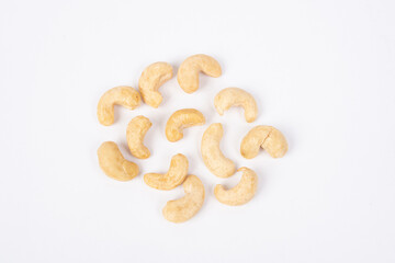 cashew beans on white background, close-up