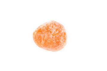 Dried tangerine on a white background, close-up
