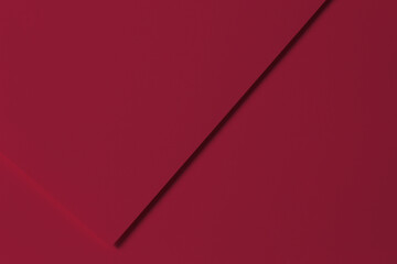 Creative abstract viva magenta color paper background. Solid colors geometric lines and shapes. Top view