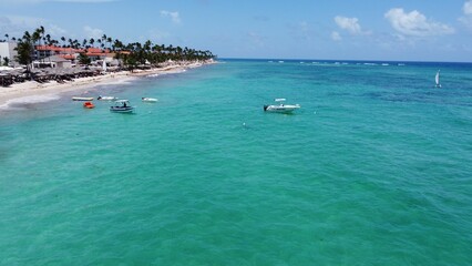 Aerial view of a beautiful beach with green water in the Dominican Republic