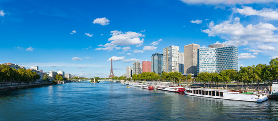 Fototapeta na wymiar Skyline panorama of Beaugrenelle district of Paris with Eiffel Tower in the background. France