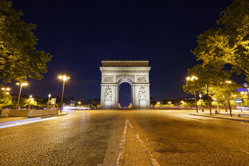 Obraz premium The Arc de Triomphe at the centre of Place Charles de Gaulle in Paris. France
