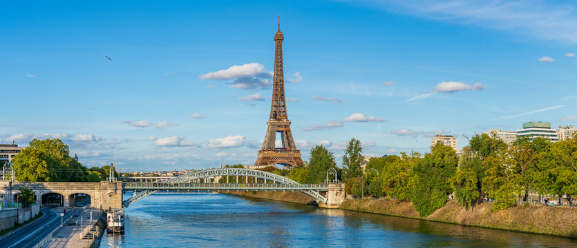 Eiffel Tower by seine river in autumn season in Paris. France