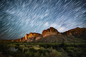 Star trails over the Bulldog Cliffs of the Goldfield Mountains
